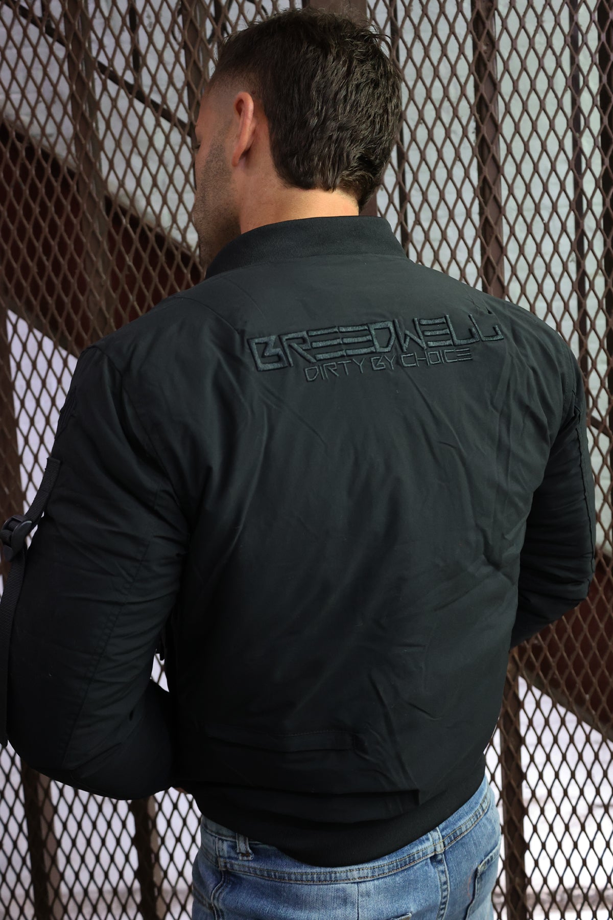 STRAPPED BOMBER JACKET